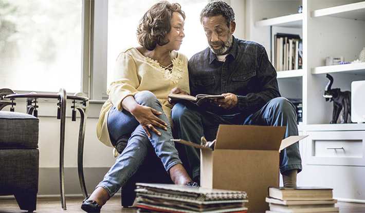 Senior-couple-reading-book